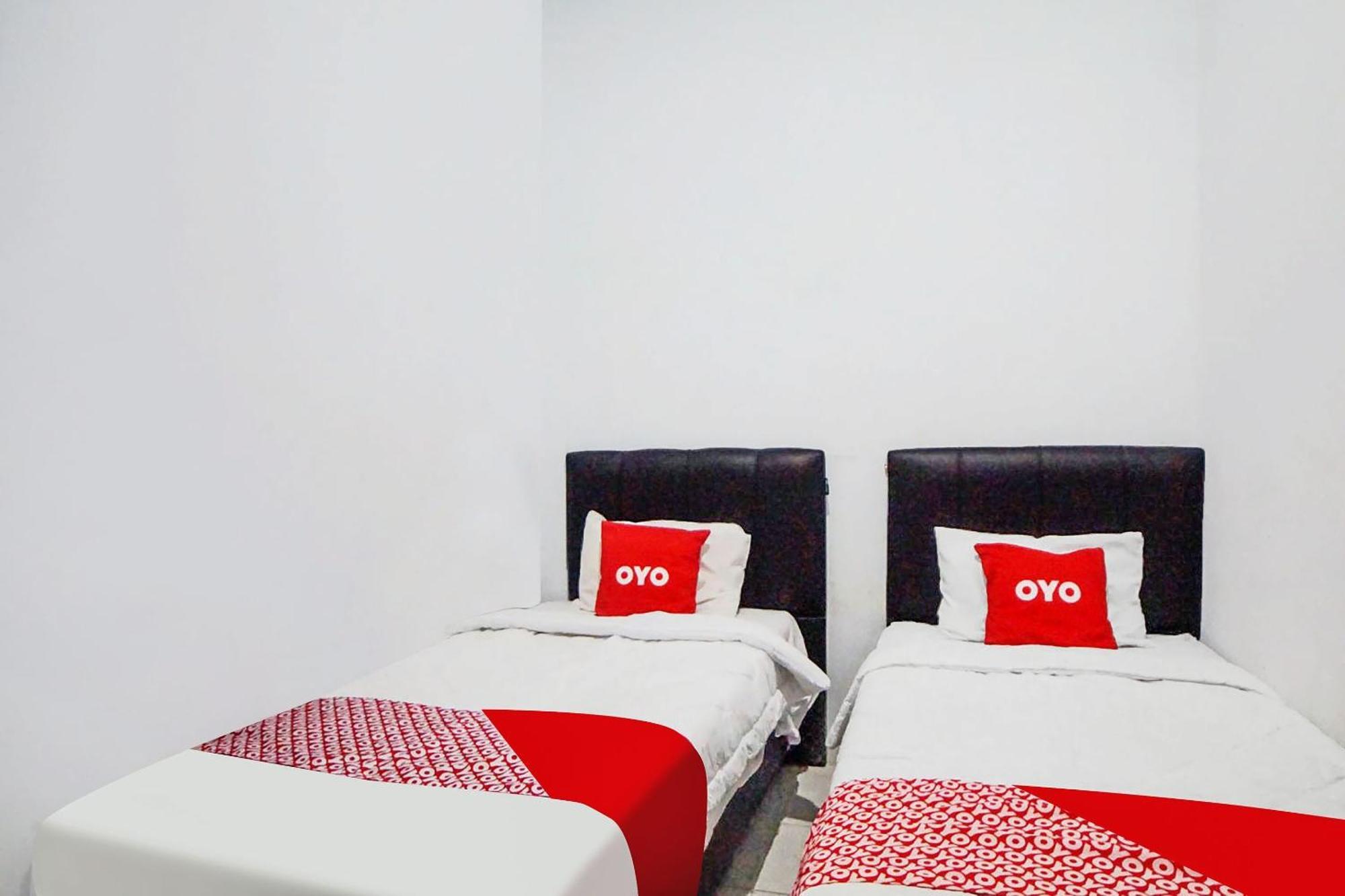 Super Oyo 91627 Wika Wiki Homestay Medan Buitenkant foto